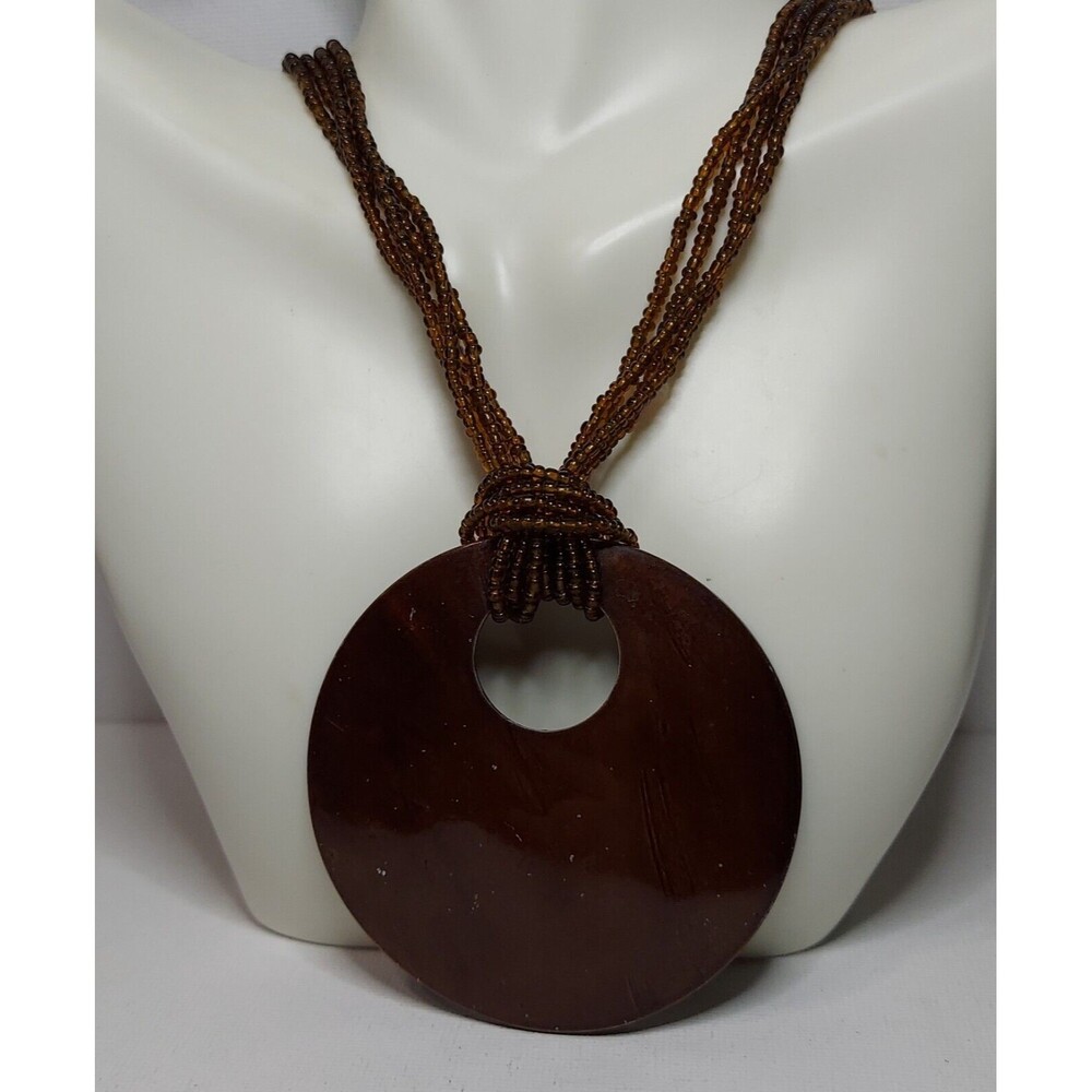 Unbranded necklace Small brown beads 4-strand 20" with 2 3/4" MOP pendant